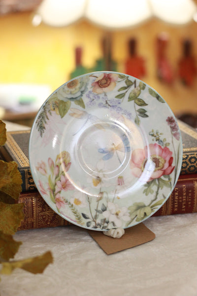 Tan Teacup Holster with Floral Scene Core Teacup and Saucer