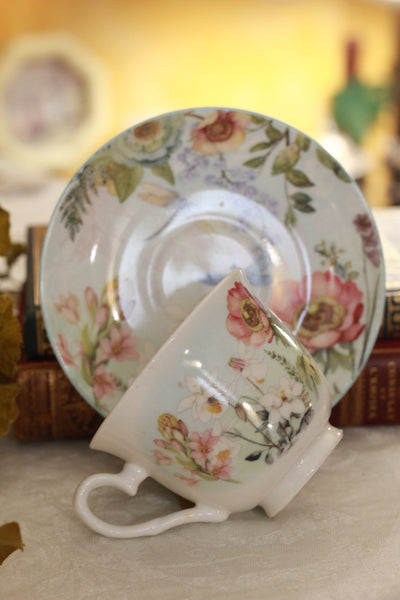 Tan Teacup Holster with Floral Scene Core Teacup and Saucer