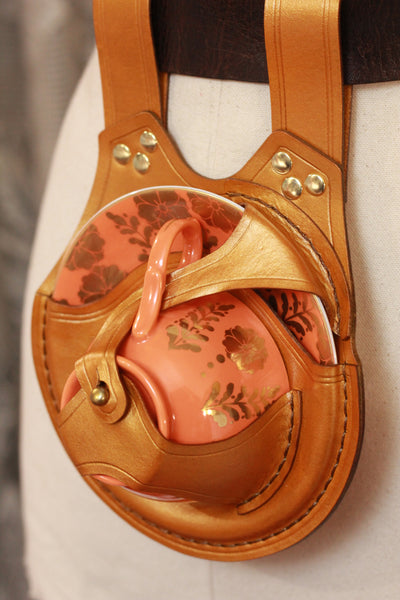 Shiny Gold Teacup Holster with Gold and Orange Teacup and Saucer