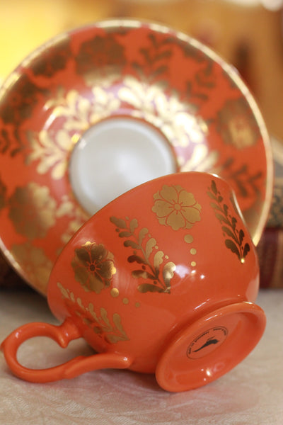 Shiny Gold Teacup Holster with Gold and Orange Teacup and Saucer