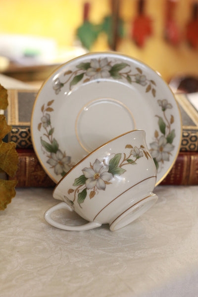 Brown Teacup Holster with Lily and Leaves Teacup and Saucer